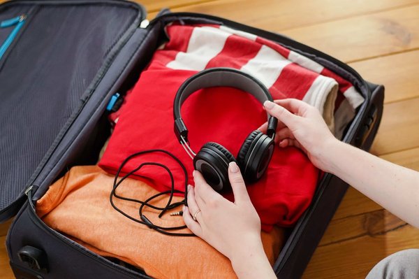 Comment ranger une valise pour les vacances et respecter les 23 kg imposés ?